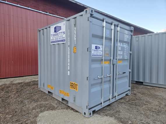 An empty storage container with its doors open