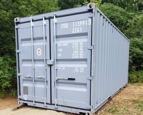 A 20 foot gray shipping container